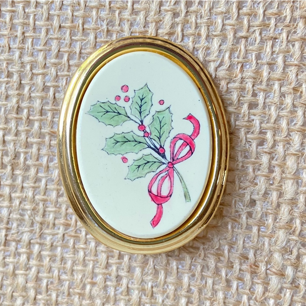 Barlow vintage oval goldtone brooch pin with Christmas holly sprig red ribbon